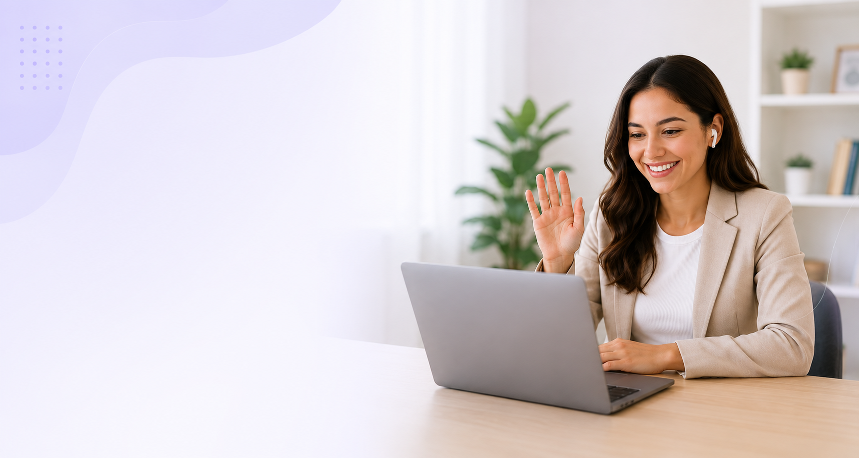 Candidate waving during an online mock interview on a laptop